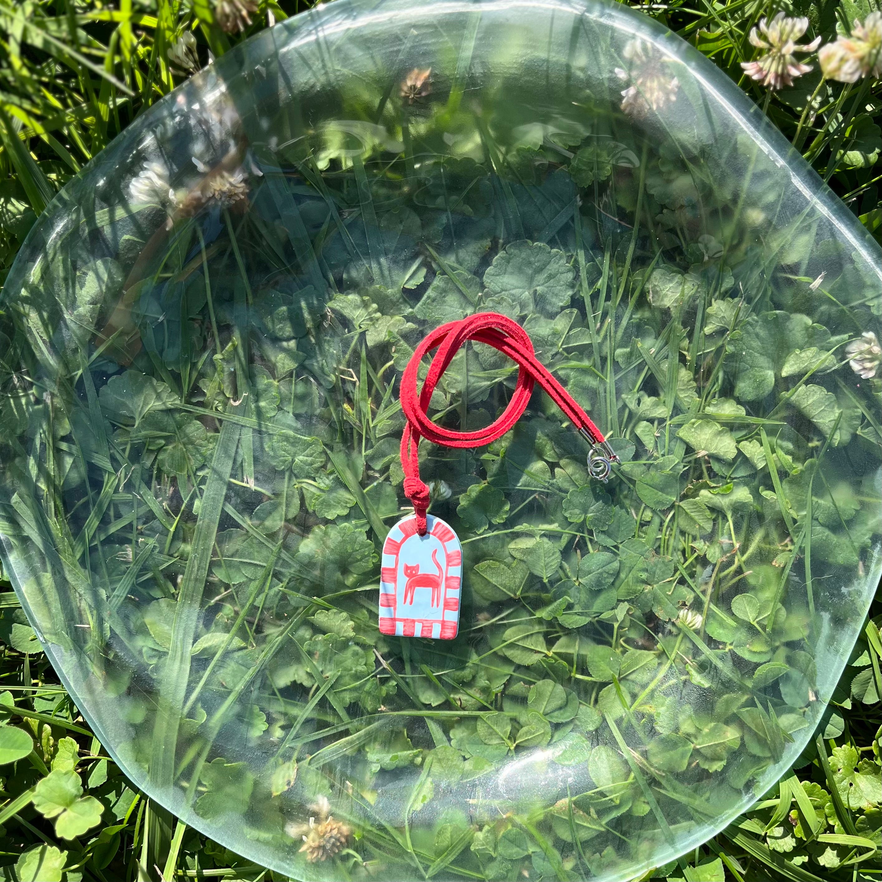 Hand Painted Blue Pendant Necklaces on Red Suede Cord